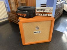 An Orange Tiny Terror amp and an Orange 16 unit amp