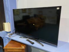 A JVC TV and remote