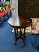 A reproduction mahogany occasional table