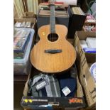 A Tanglewood guitar and various clothes