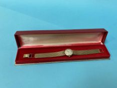 A ladies 9ct gold Omega wristwatch, 32.6g total, with box