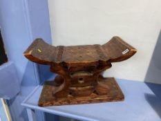 A carved Oriental stool