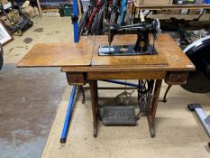 A Singer Treddle sewing machine