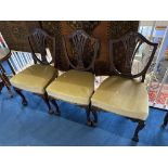 Three mahogany chairs