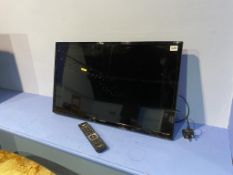 A Hitachi TV and remote