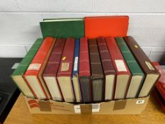 A collection of stamp albums and contents