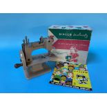 A boxed Singer Sew Handy child's sewing machine, model no. 20