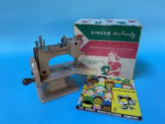 A boxed Singer Sew Handy child's sewing machine, model no. 20