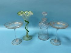 A Vaseline glass spill vase, a decanter and two gilt decorated cocktail glasses