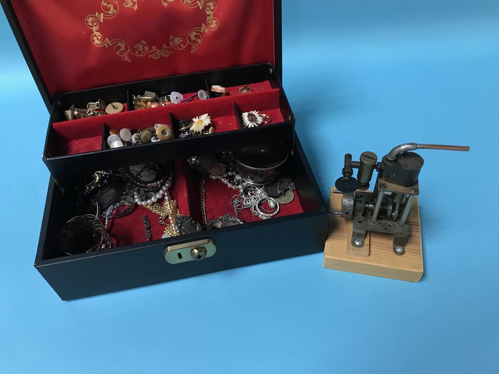 A jewellery box and contents and a model engine