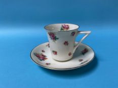 A Royal Doulton tea set, decorated with roses