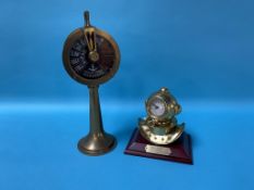 A model Ship's telegraph and a Diver's helmet clock