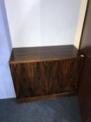A small rosewood two door cabinet, 84cm wide
