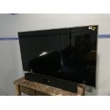A Panasonic 65" 3 D Television, with sound bar, 3D glasses, remote and selection of 3D Dvds