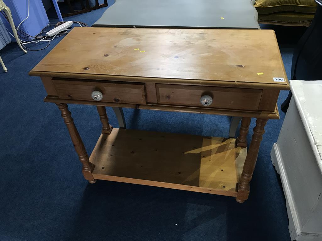 A pine two drawer side table, 90cm wide