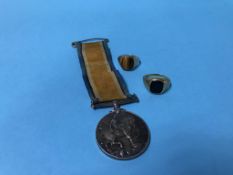 A World War I medal to T. Bremer 7104, A. SMN R.N.R. and two 9ct signet rings, 7 grams