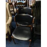 Pair of teak framed chairs