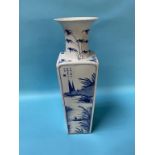 A tall tapering square Chinese blue and white vase, each side decorated with landscape scenes, marks