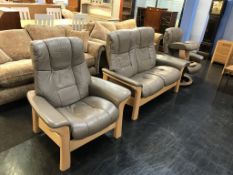A Stressless Windsor two seater settee, (retails £3,199), a Windsor armchair, (retails £2,609) and a