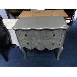 A grey decorative bombe two drawer chest of drawers, 76cm wide