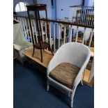 A Lloyd Loom chair, coffee table and a mahogany plant pedestal