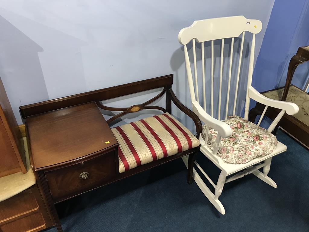 A telephone seat and a rocking chair