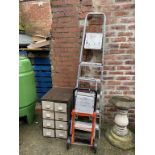 A filing cabinet, sack barrow and two pairs of step ladders