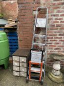 A filing cabinet, sack barrow and two pairs of step ladders