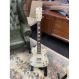 A cream electric Guitar, a/f