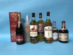 Four bottles of whisky, to include Bells, Dalwhinie etc., a bottle of Piper Heidsieck champagne etc.