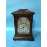 A mahogany cased mantle clock