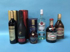 A bottle of Drambuie whisky, Glayva whisky, Bacardi rum and Courvoisier cognac etc.
