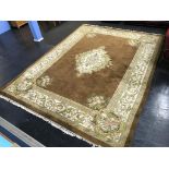 A brown rug, 376cm x 275cm