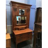 An Edwardian mahogany two piece bedroom suite