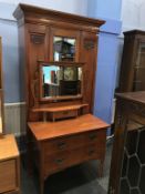 An Edwardian mahogany two piece bedroom suite