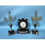 A slate mantle clock and garniture