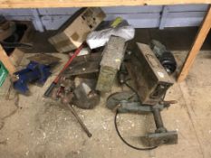 Various tools to include a vice and a jack etc.