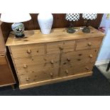 A pine chest of seven drawers