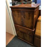 A yew wood cocktail cabinet
