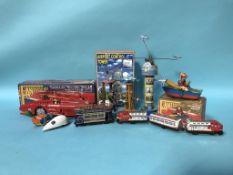 A collection of modern tin plate toys