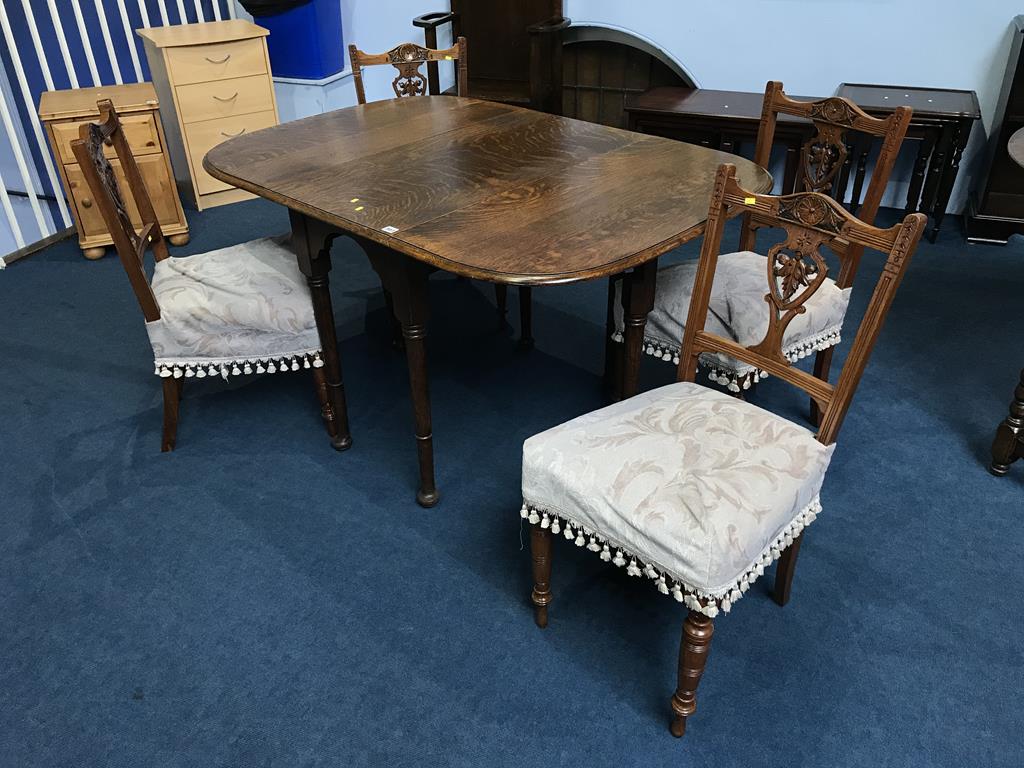 A set of four Edwardian walnut chairs