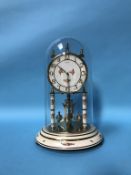 A glass domed Anniversary clock