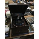 A gramophone and an enamel bread bin