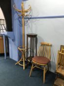 A coat stand, plant pedestal and a spindle back chair