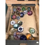 A collection of paperweights