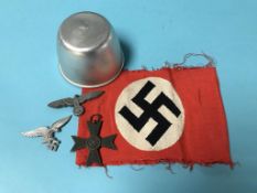An aluminium Luftwaffe mess cup, arm band, various badges and a medal stamped 1939