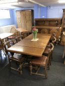 An oak Lees style eight piece dining room suite