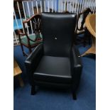 A black leather armchair