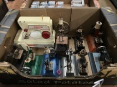 A collection of vintage toy sewing machines