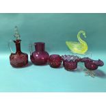 A collection of Victorian cranberry glass and a decanter